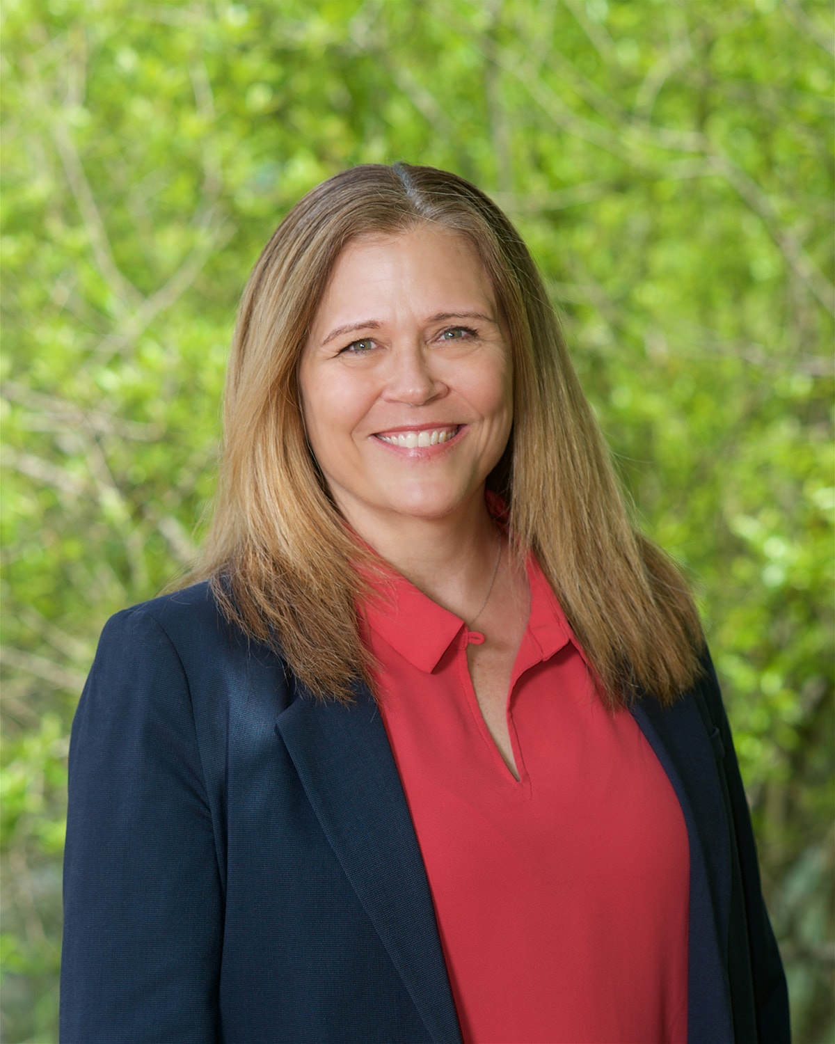 Headshot of Kristina Smith smiling warmly